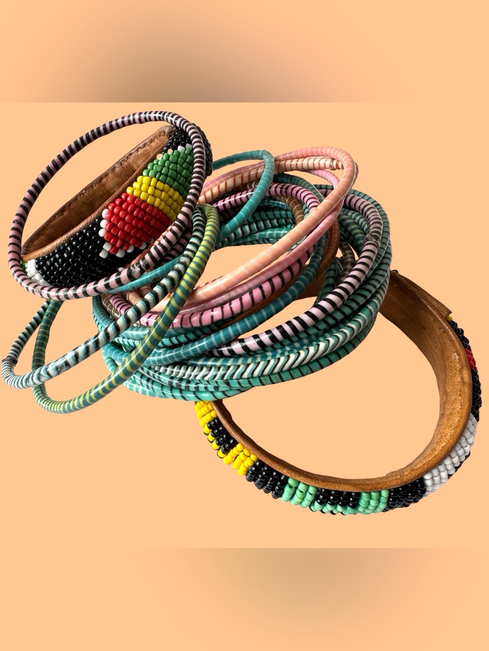 A bunch of African bangles bracelets jewelry